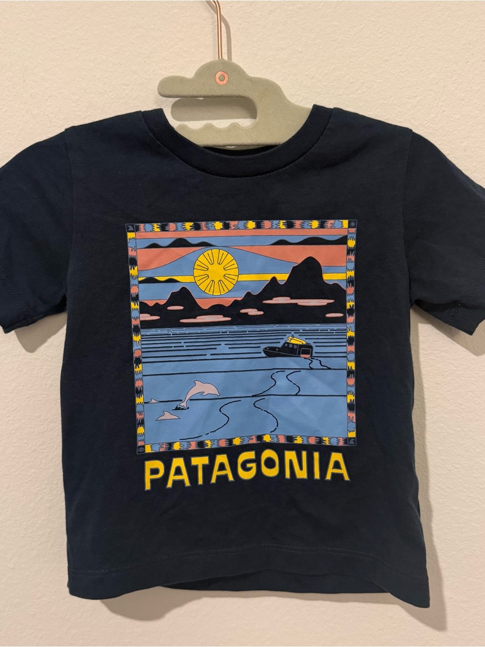 Patagonia Navy Short-Sleeve Tee with Sunset Ocean Graphic